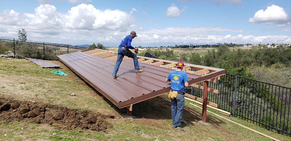 The Solar Pool Services crew framing and mounting a rooftop system