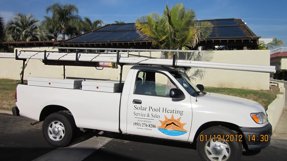The Solar Pool Services branded service truck on a job site